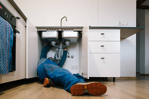 Professional Emergency Plumber technician working in Archer, FL